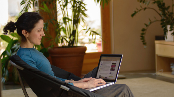 Student works on laptop from home