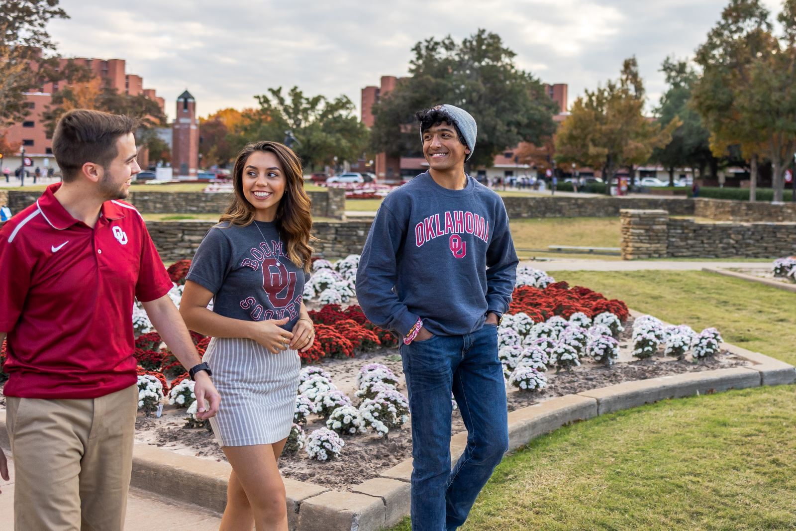 3 students walking on campus